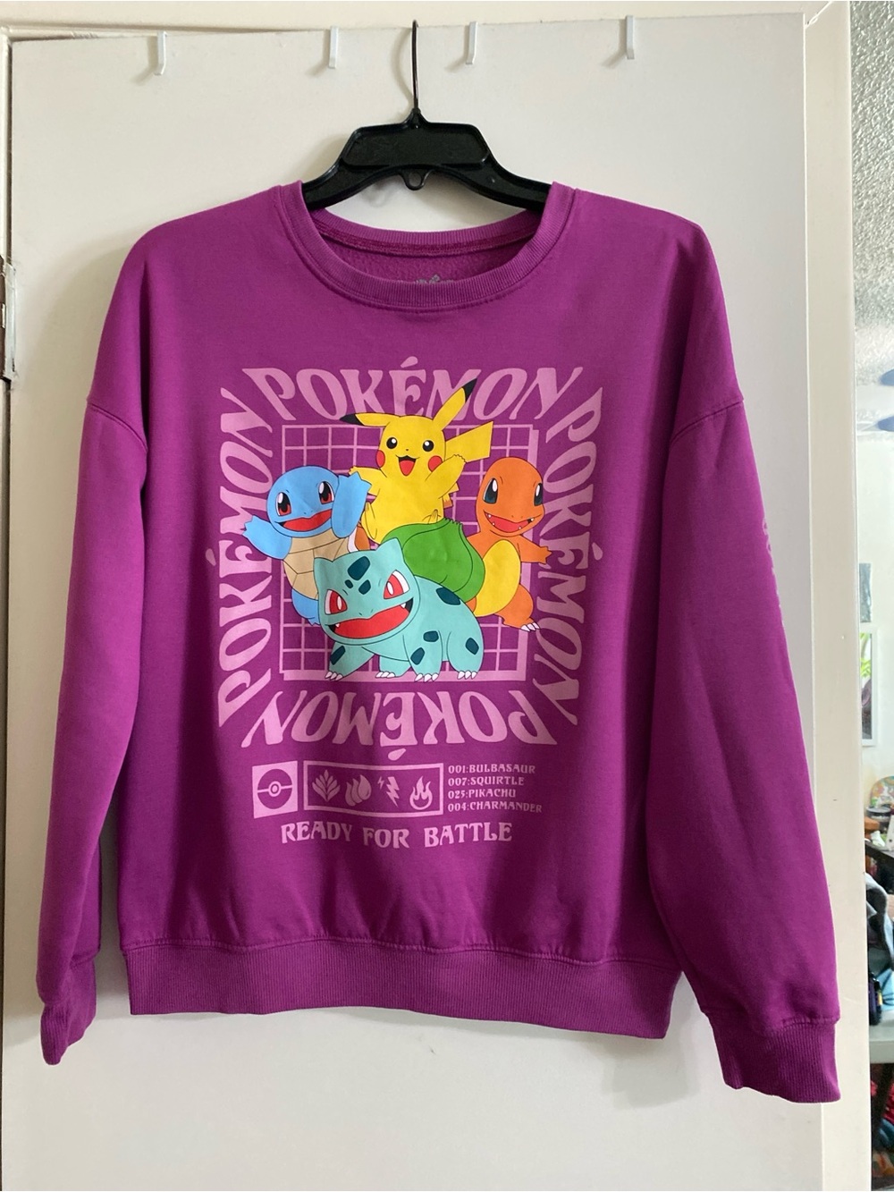 Pokémon bright purple sweatshirt, excellent condition no fuzz balls